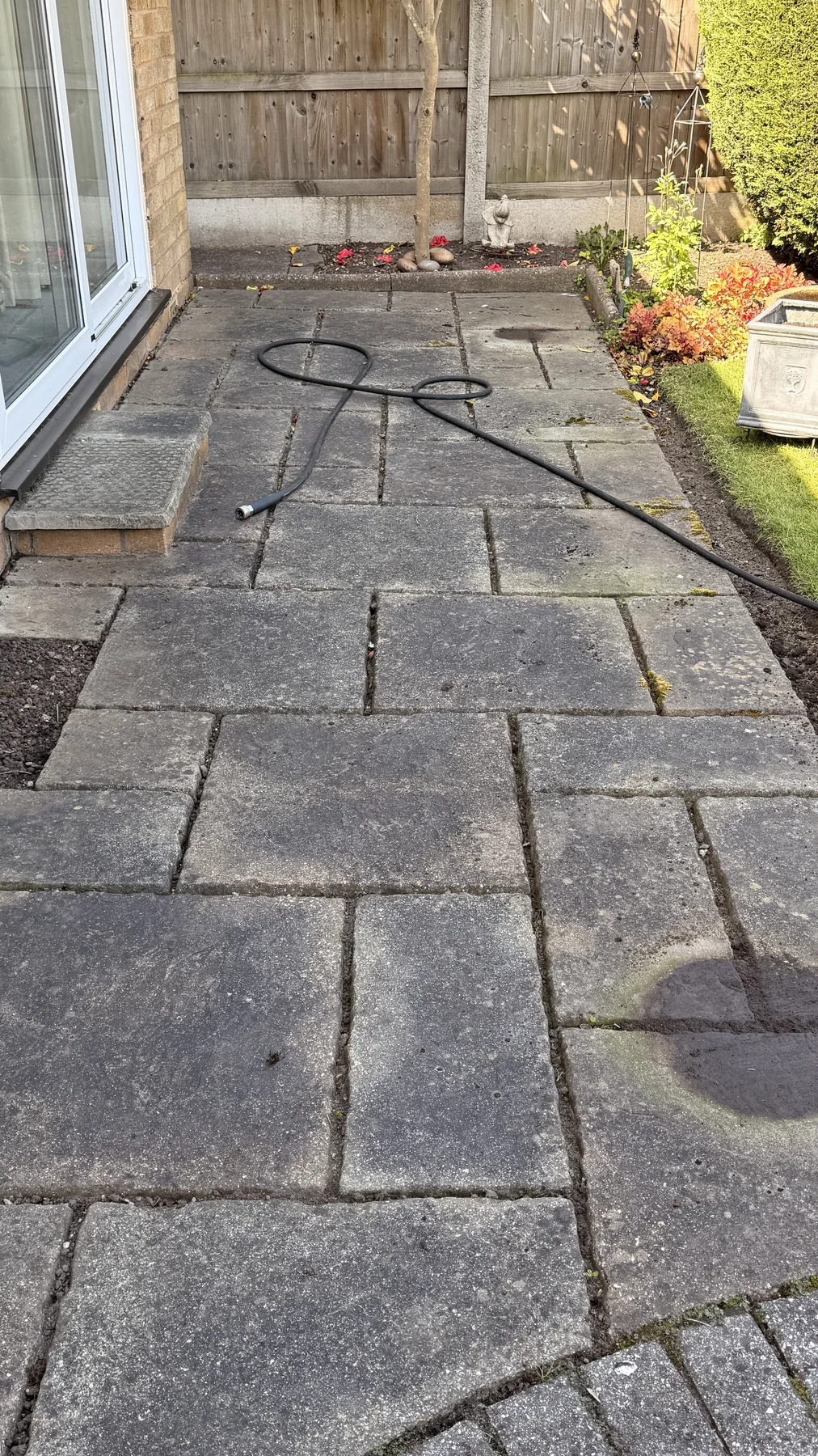 Patio paving before cleaning